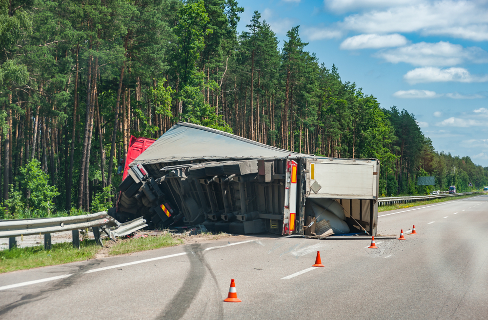 Explore the common characteristics of truck rollover accidents, including causes and risk factors involved.